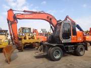 Колесный экскаватор Hitachi  ZX125W.