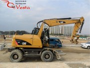 Колесный Экскаватор Caterpillar  M313D,  2009 год 